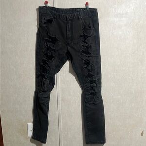 Black Skinny Distressed Jeans with Tapered Legs